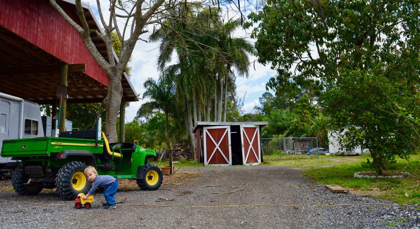 A person working on a tractor.